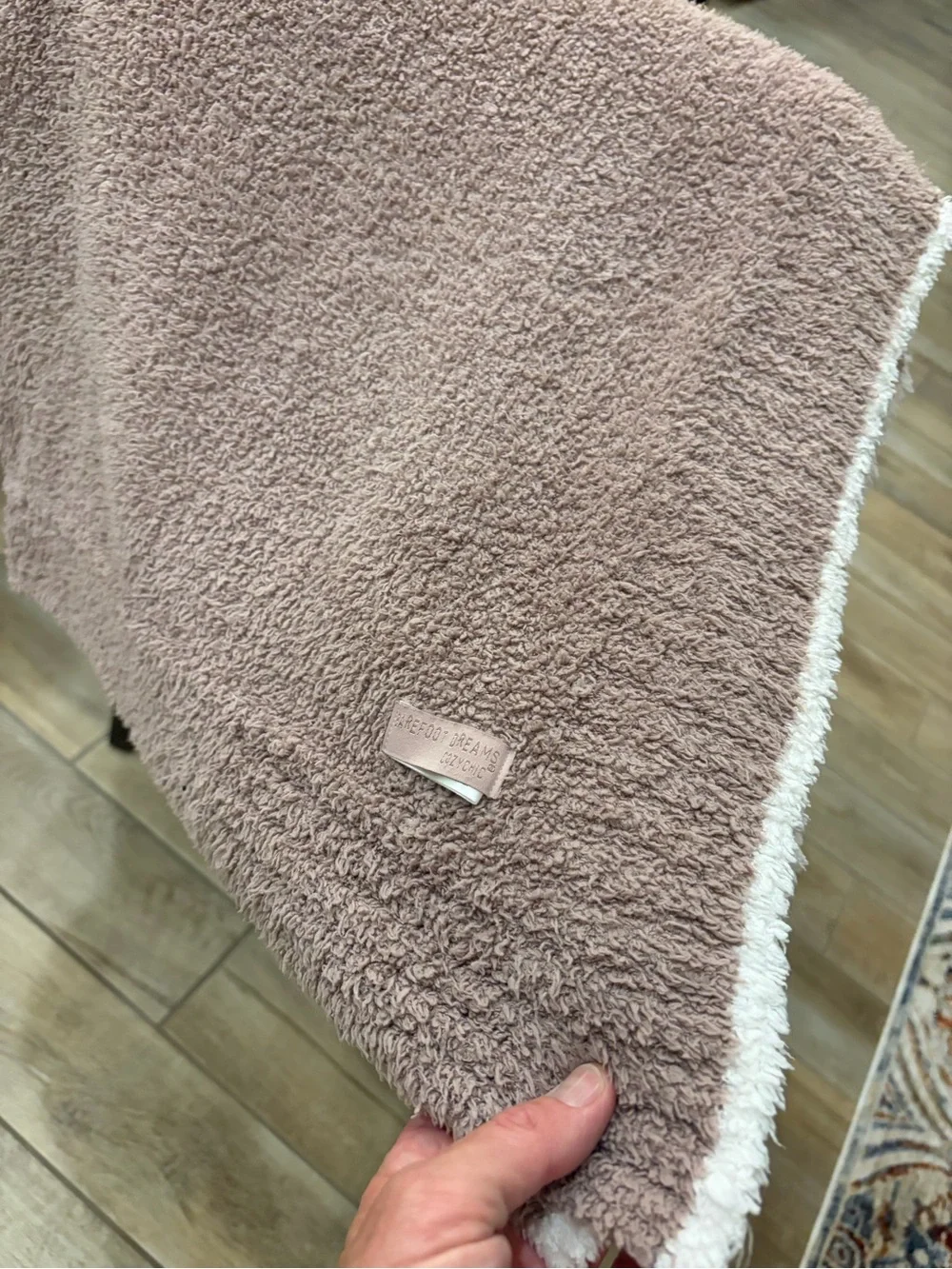Barefoot Dreams CozyChic mauve pink throw